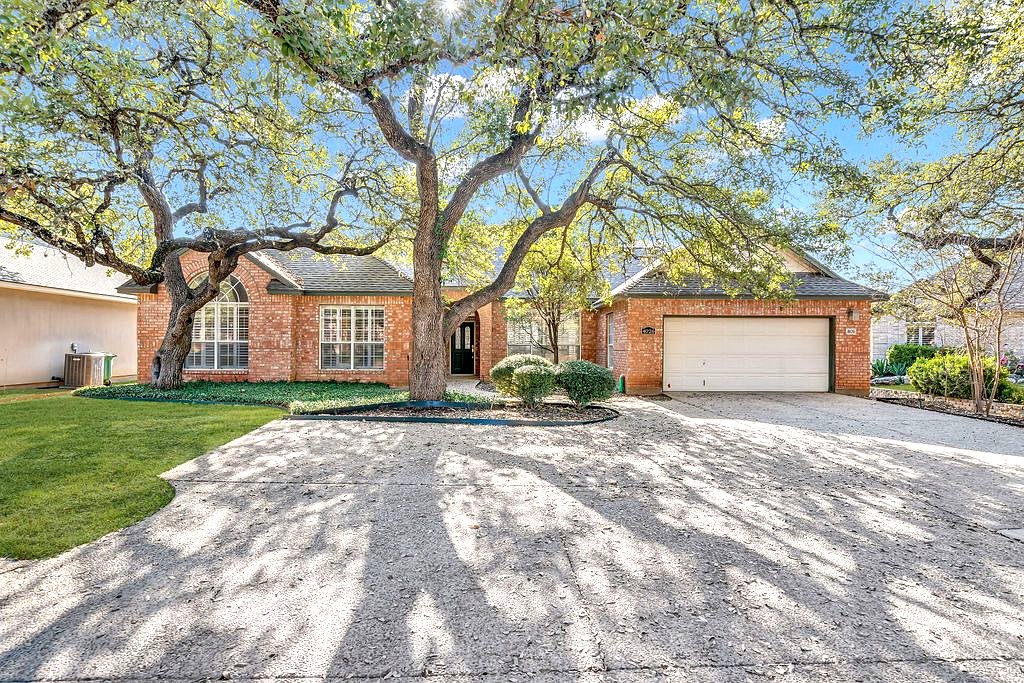 A single-family home with a well-kept front yard, managed by Imago Property Management